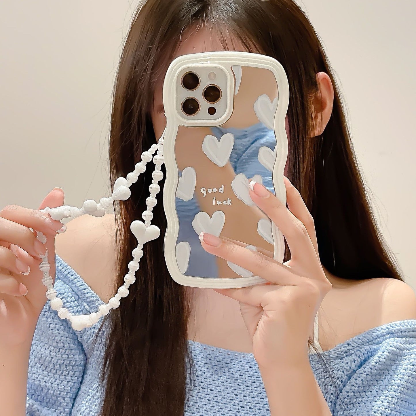Coque miroir "Love" à bords ondulés